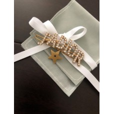 Spinka do włosów Cristian Dior JAdior w kształcie gwiazdy z logo i diamentami dla kobiet