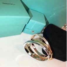 Bransoletka damska Tiffany Atlas z zamkniętymi zawiasami w kolorze srebra, różu/żółtego złota, z kryształkami